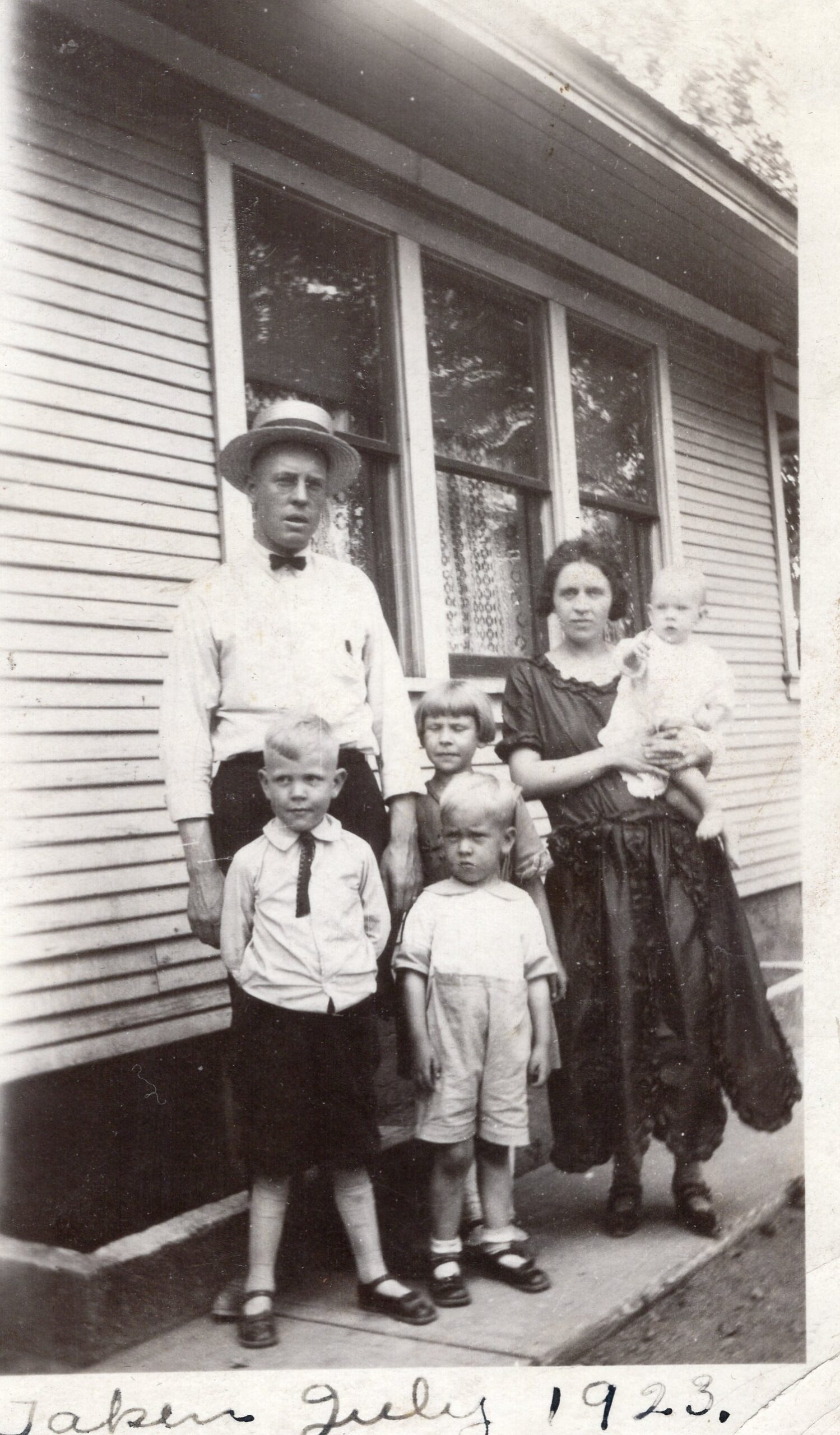Albert and Orilla Leah, Vard, Wendell, and Naomi taken 7-22-1923 at Magna, UT